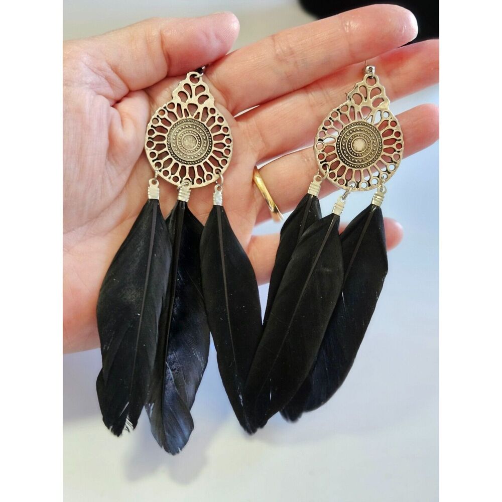 Silver tone black feather statement earrings
